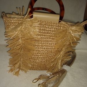 Sondra Roberts squared straw bag.